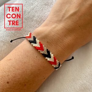 Miyuki bracelet with sliding knot on the back in red, black and white