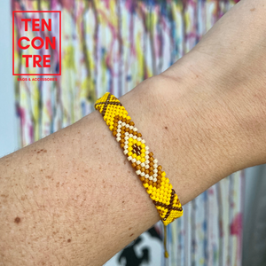Miyuki bracelet with sliding knot on the back in yellow tones